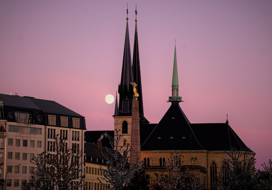 The cathedral of Luxembourg in the sunset, the momunemtn of the Golden Lady just in front of the shot