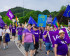 Lots of Volters marching with flags and banners